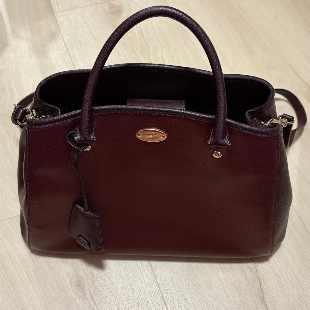 COACH Elegant burgundy Leather Handbag
